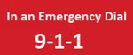 Red sign with white text that reads: In an Emergency Dial 9-1-1.