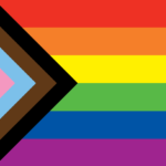 The image shows the Progress Pride Flag, featuring horizontal stripes of red, orange, yellow, green, blue, and purple, with a chevron of black, brown, light blue, pink, and white stripes on the left side.